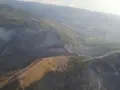 Imagen aérea de la situación del área afectada por el incendio esta mañana  | @AT_Brif