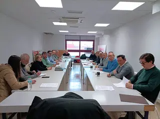 Imagen de la firma de un convenio-Archivo