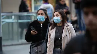 Gente con mascarilla