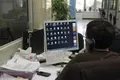 Trabajador, funcionario, ordenador. Europa Press. Archivo