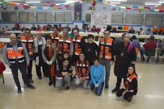 Voluntarios de Protección Civil en la cena de 2019
