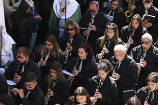 Imagen de la banda acompañando a la Esperanza en la mañana de Jueves Santo- Archivo