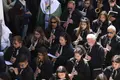 Imagen de la banda acompañando a la Esperanza en la mañana de Jueves Santo- Archivo