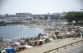 Varios inmigrantes acampados en una playa, a 31 de agosto de 2026, en Ceuta. Marcos Moreno. Europa Press