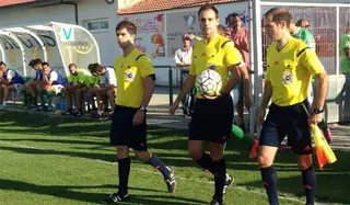 Juan Bustos y su equipo antes de un partido en Astorga