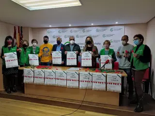 Voluntarias de la AECC en la presentación de Fotos con corazón